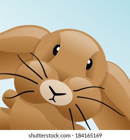 Brown easter bunny with bended down ears closeup