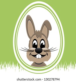 brown easter bunny white egg green background