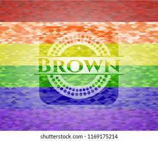 Brown emblem on mosaic background with the colors of the LGBT flag