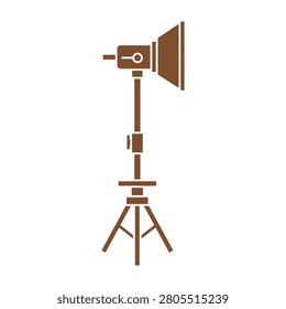 Brown film camera on tripod stand for photography and videography equipment setup
