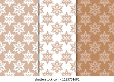 Brown floral backgrounds. Set of seamless patterns for textile and wallpapers