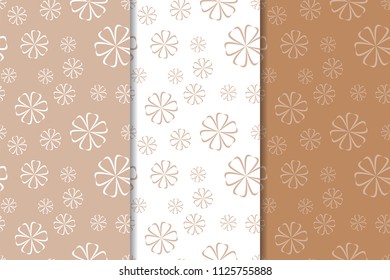 Brown floral backgrounds. Set of seamless patterns for textile and wallpapers