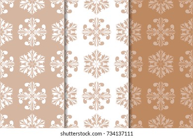 Brown floral backgrounds. Set of seamless patterns for textile and wallpapers