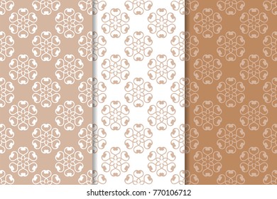 Brown floral backgrounds. Set of seamless patterns for textile and wallpapers