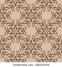 Brown floral ornament on beige background. Seamless pattern for textile and wallpapers