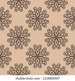 Brown floral ornament on beige background. Seamless pattern for textile and wallpapers