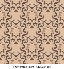Brown floral ornament on beige background. Seamless pattern for textile and wallpapers