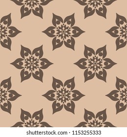 Brown floral ornament on beige background. Seamless pattern for textile and wallpapers