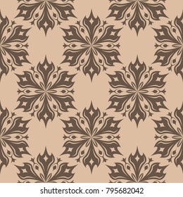 Brown floral ornament on beige background. Seamless pattern for textile and wallpapers