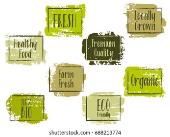 Brown and green vector organic labels, bio emblems collection for menu or natural products, food packaging. Fresh, vegan, eco friendly, premium quality, locally grown, healthy food painted stickers.