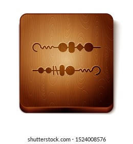 Brown Grilled shish kebab on skewer stick icon isolated on white background. Meat kebab on skewer stick. Picnic with grilled meat. Wooden square button. Vector Illustration