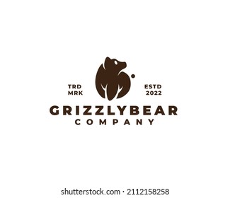 Brown Grizzly Bear Cub Logo Concept. Vector Illustration