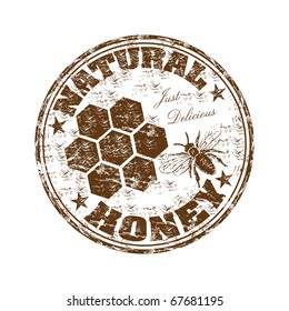 Brown grunge rubber stamp with bee and the text natural honey written inside the stamp