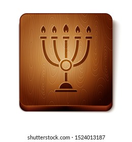 Brown Hanukkah menorah icon isolated on white background. Hanukkah traditional symbol. Holiday religion, jewish festival of Lights. Wooden square button. Vector Illustration