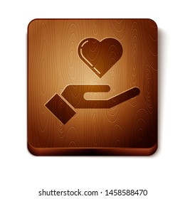 Brown Heart on hand icon isolated on white background. Hand giving love symbol. Wooden square button. Vector Illustration