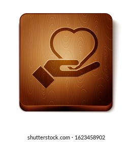 Brown Heart on hand icon isolated on white background. Hand giving love symbol. Valentines day symbol. Wooden square button. Vector Illustration