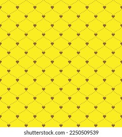 Brown heart shape linked with brown dot ogee on yellow background. Happy Valentine's day. Heart pattern on yellow backdrop.