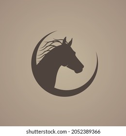 brown horse head silhouette. simple and modern. can be used as a logo.