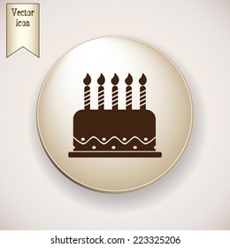 Brown icon on the round button with shadow. Vector icon cake