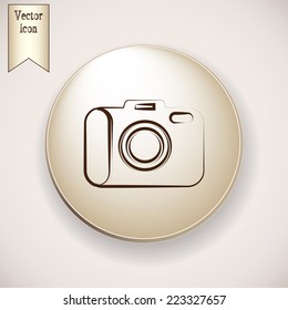 Brown icon on the round button with shadow. Vector icon