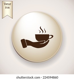 Brown icon on the round button with shadow. Vector icon hand hold coffee cup 