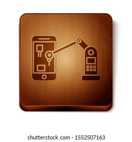 Brown Industrial machine robotic robot arm hand on mobile phone factory icon isolated on white background. Industrial robot manipulator. Wooden square button. Vector Illustration