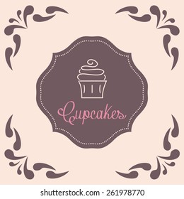 a brown label with text and a cupcake on a colored background