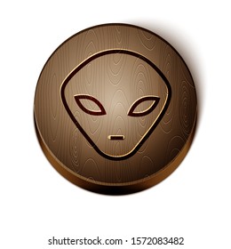Brown line Alien icon isolated on white background. Extraterrestrial alien face or head symbol. Wooden circle button. Vector Illustration