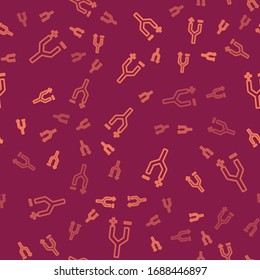 Brown line Electric cable icon isolated seamless pattern on red background.  Vector Illustration