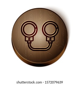 Brown line Handcuffs icon isolated on white background. Wooden circle button. Vector Illustration