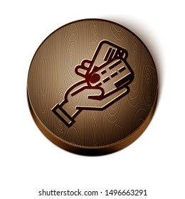 Brown line Human hand holding with credit card icon isolated on white background. Online payment. Pay by card. Financial operations. Wooden circle button. Vector Illustration