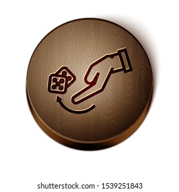 Brown line Human hand throwing game dice icon isolated on white background. Wooden circle button. Vector Illustration
