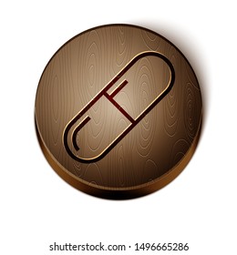Brown line Medicine pill or tablet icon isolated on white background. Capsule pill and drug sign. Pharmacy design. Wooden circle button. Vector Illustration
