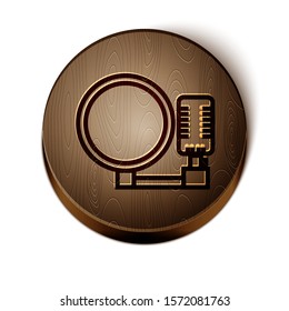 Brown line Microphone icon isolated on white background. On air radio mic microphone. Speaker sign. Wooden circle button. Vector Illustration