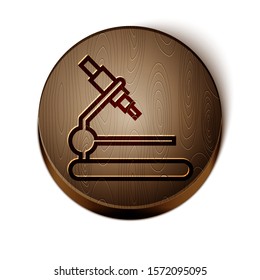 Brown line Microscope icon isolated on white background. Chemistry, pharmaceutical instrument, microbiology magnifying tool. Wooden circle button. Vector Illustration