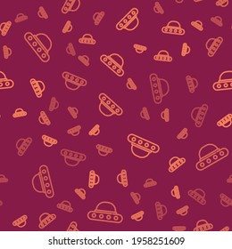 Brown line UFO flying spaceship icon isolated seamless pattern on red background. Flying saucer. Alien space ship. Futuristic unknown flying object.  Vector