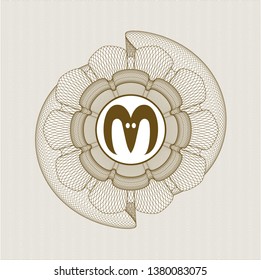 Brown money style emblem or rosette with goat head icon inside