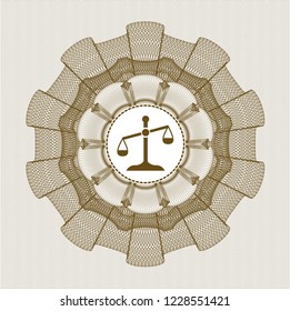 Brown money style rosette with scale icon inside