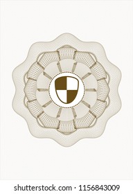 Brown money style rosette with shield, safety icon inside