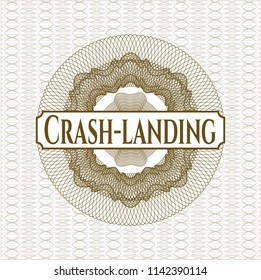 Brown money style rosette with text Crash-landing inside