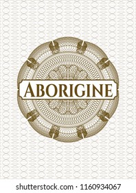 Brown money style rosette with text Aborigine inside
