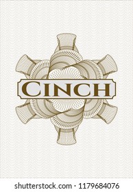 Brown money style rosette with text Cinch inside