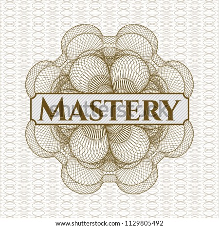 Brown money style rosette with text Mastery inside