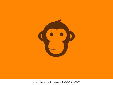 Brown monkey head logo with orange background. Illustration of monkey and monkey head. Animated ape animal