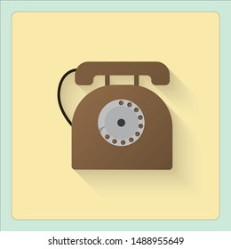 brown old telephone of dial type