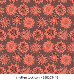Brown and orange doodle seamless flower pattern. Vector background.