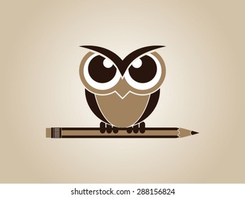 Brown owl and pencil