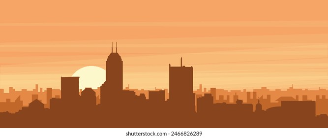 Brown panoramic poster of the city skyline with misty background buildings, sunrise, clouds and mountains of INDIANAPOLIS, UNITED STATES