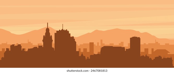 Brown panoramic poster of the city skyline with misty background buildings, sunrise, clouds and mountains of MONTEVIDEO, URUGUAY