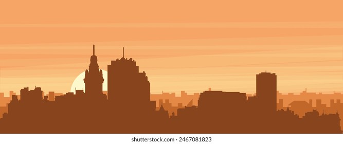Brown panoramic poster of the city skyline with misty background buildings, sunrise, clouds and mountains of MONTEVIDEO, URUGUAY